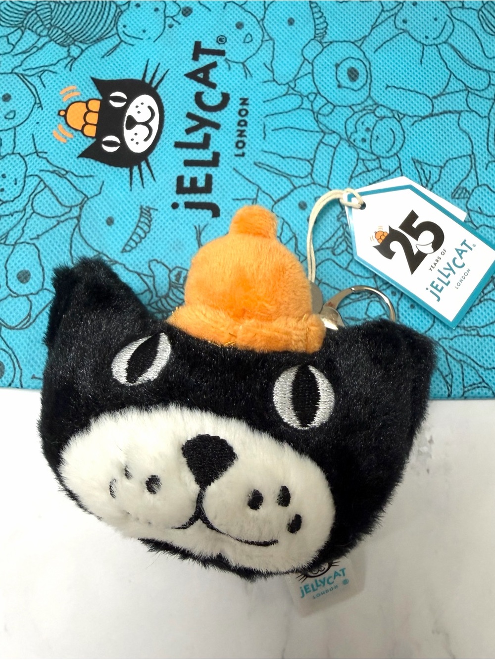 Jellycat Black and White Cat Keychain with Orange Hat